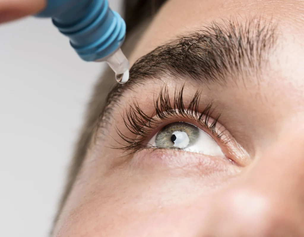 Dos and Don’ts After Cataract Surgery: A Guide to a Smooth Recovery 1 handsome man using eye drops close up