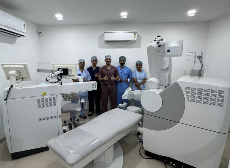 Doctor and team with Presbyond Laser Eye Surgery Machine